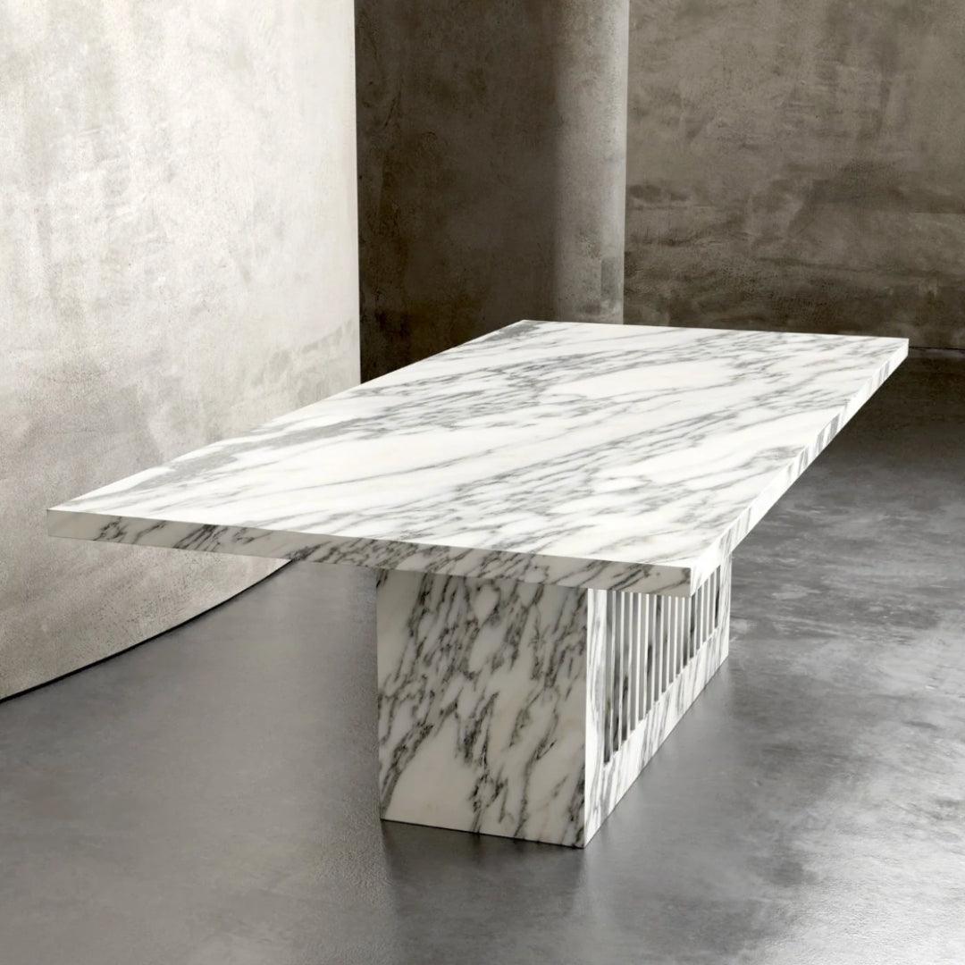 Side view of the Marina Plinth dining table featuring a rectangular Arabescato marble top and sturdy plinth base, perfect for elegant UAE interiors.