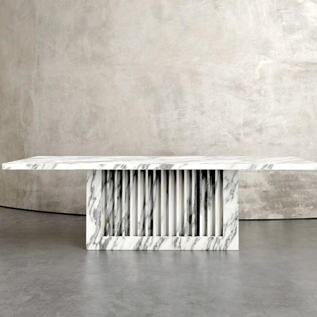 Elegant Marina Plinth dining table made from premium Arabescato marble with a rectangular top and sturdy base, perfect for modern UAE homes.