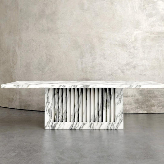 Elegant Marina Plinth dining table made from premium Arabescato marble with a rectangular top and sturdy base, perfect for modern UAE homes.