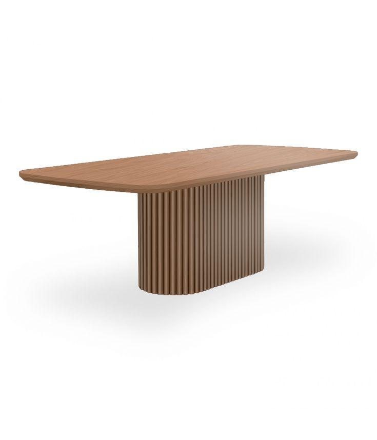 Levant fluted wood dining table with rounded edges and racetrack base, perfect for modern dining room decor in UAE homes.