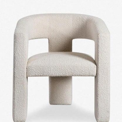 Front view of the Sia Boucle Chair with boucle fabric upholstery and modern design, perfect for stylish dining rooms and contemporary interiors.