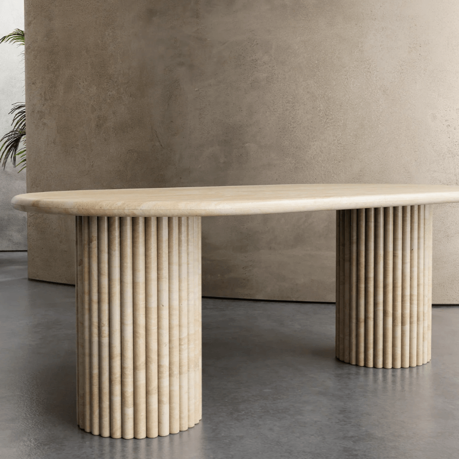 Elegant Travertine Marble Dining Table with reeded pedestal bases and natural stone finish, perfect for luxury dining spaces in UAE homes.