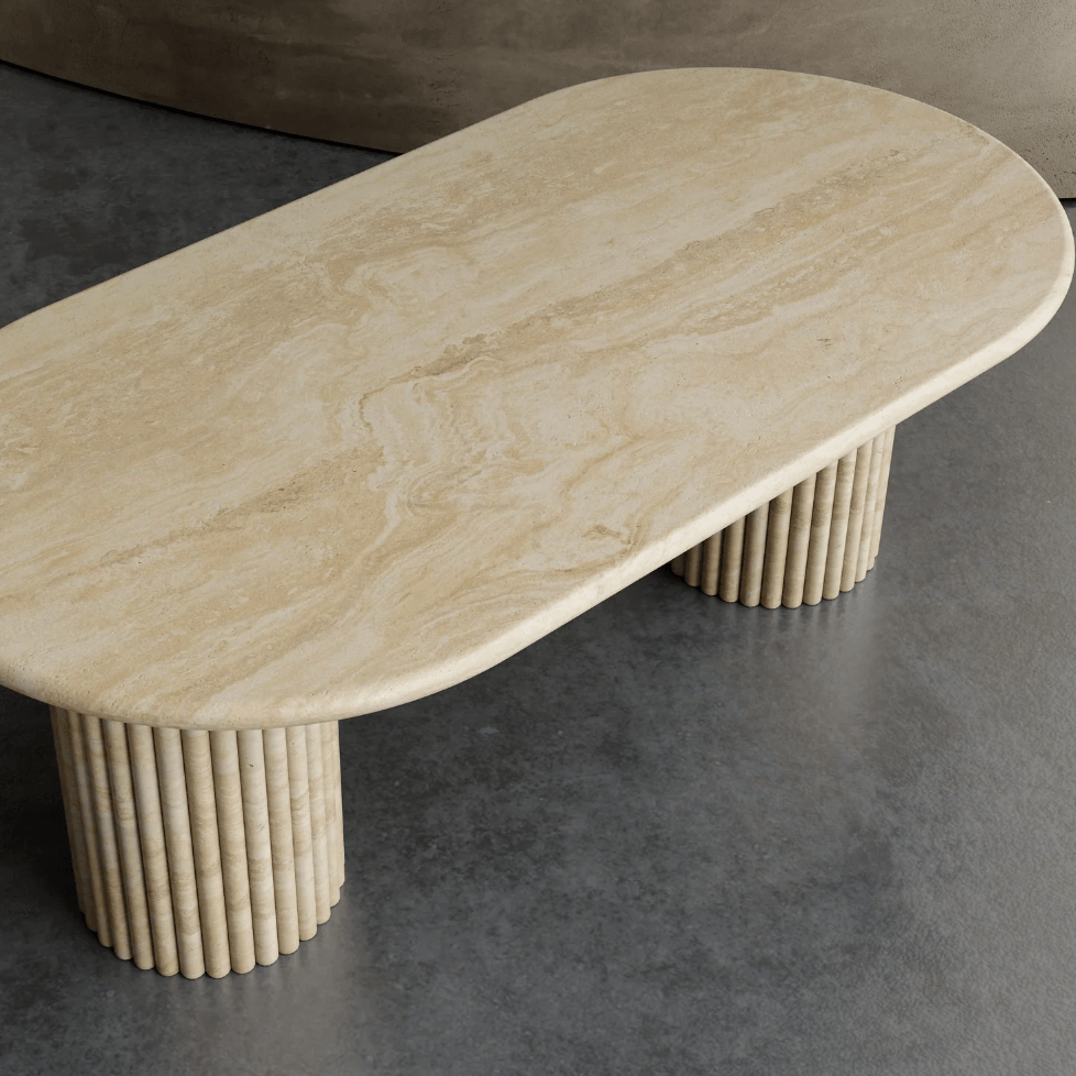 Oval Travertine Marble Dining Table with reeded bases, showcasing a natural stone finish and timeless elegance for luxury dining rooms in UAE.