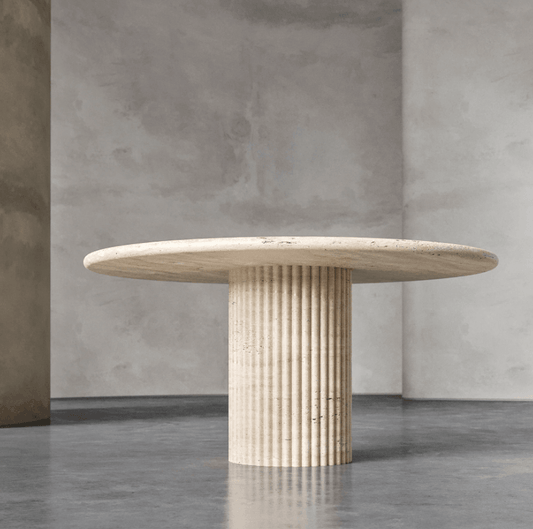 Round Travertine Marble Dining Table with a fluted pedestal base, perfect for modern and elegant dining spaces in UAE homes.