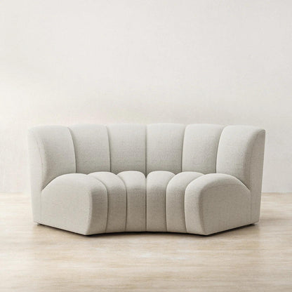 Ceci Cloud Sofa in off-white boucle fabric, featuring a compact curved tufted design. Perfect for modern and stylish living spaces in UAE.