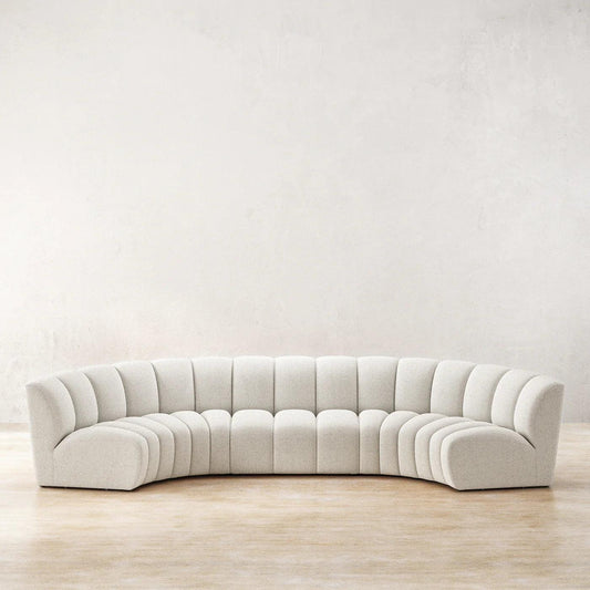 Ceci Cloud Sofa in off-white boucle fabric, featuring a curved tufted design. A luxurious modern centerpiece for spacious living rooms in UAE.