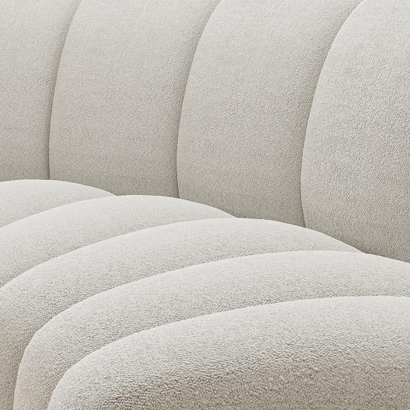 Close-up of Ceci Cloud Sofa tufted design in boucle fabric, showcasing modern craftsmanship and luxury materials for premium UAE living rooms.