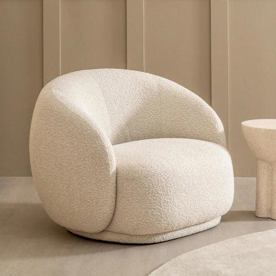Cloud Boucle Armchair with a curved backrest and plush foam cushion, upholstered in white boucle fabric, perfect for modern and elegant living spaces.