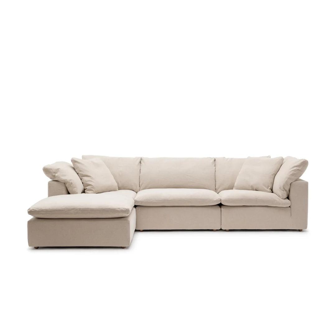Feather Modular Cloud Sofa in beige linen fabric, featuring a spacious L-shaped design. Ideal for modern living rooms and elegant homes in UAE.